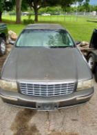 donated grey car